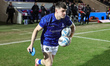 Josh Thewlis of Warrington Wolves participates in the pre-game warm-up during the Betfred...