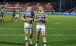 Josh Thewlis of Warrington Wolves and Sam Powell of Warrington Wolves celebrate the win wi...