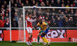 Gabriel Jesus of Arsenal battles for the ball in the air against Adedeji Oshilaja of Mansf...
