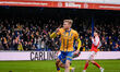 Will Evans of Mansfield Town celebrates his goal to make it 1-1 during the Emirates FA Cup...