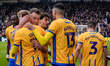 Will Evans of Mansfield Town celebrates his goal to make it 1-1 during the Emirates FA Cup...