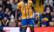 Adedeji Oshilaja of Mansfield Town plays during the Emirates FA Cup fifth round match betw...