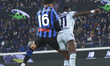 Raoul Bellanova and Hassane Kamara are in action during the Serie A match between Atalanta...