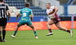 Tui Lolohea runs during the BetFred Super League match between Huddersfield Giants and Hul...