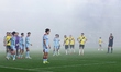The match temporarily halts due to fireworks smoke during the Dutch Eredivisie match betwe...