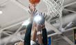 Darius Ratliff shoots a layup during the Catholic High School Athletic Association Champio...