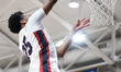 Jasiah Jarvis goes for a layup during the Catholic High School Athletic Association Champi...