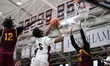 Hassan Koureissi shoots a layup during the Catholic High School Athletic Association Champ...