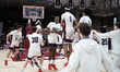 The Stepinac team jumps after winning the New York State Catholic Basketball Championship...