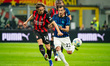 Luka Modric of AC Milan and Henrikh Mkhitaryan of FC Inter play during the Italian champio...