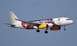 A Vueling (Dream. Play. Fly. Livery) Airbus A320-232 lands at Barcelona-El Prat Airport in...