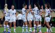 Svejna Folmli of Switzerland reacts in celebration with teammates after scoring the 1-3 go...