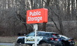 FBI agents execute a search warrant at Public Storage at 500 S. Flowers Mill Road in Langh...
