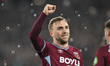Jarrod Bowen of West Ham United celebrates after scoring the team's first goal during the...