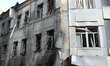 A bank building is damaged in a Russian drone strike in Dnipro, Ukraine, on March 10, 2026...