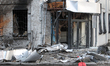 A bank building is damaged in a Russian drone strike in Dnipro, Ukraine, on March 10, 2026...