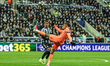 Raphinha of Barcelona clears the ball from his defensive area during the UEFA Champions Le...