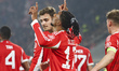 Michael Olise celebrates the goal during the UEFA Champions League last 16 first leg footb...