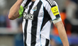 Dan Burn of Newcastle United shows dejection at full time during the UEFA Champions League...