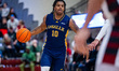 Jaden Johnson (10) of the La Salle Explorers possesses the ball during an NCAA men's baske...