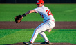 Andrew Rondini, 22, of the Rutgers Scarlet Knights, delivers a pitch during an NCAA baseba...