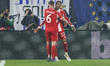 Joshua Kimmich and Michael Olise celebrate the goal during the UEFA Champions League last...