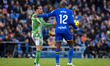 Antony of Real Betis Balompie (L) protests with Allan Nyom of Getafe CF (R) during the LaL...