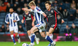 Aune Heggebo of West Bromwich Albion, age 19, is in action chased by Kuryu Matsuki of Sout...