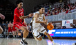 Jalen Vazquez (31) of the Lehigh Mountain Hawks drives the ball on Donte Tisinger Jr. (21)...