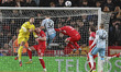 Sol Brynn, the Middlesbrough goalkeeper, punches clear from an incoming Keenan Gough of Ch...