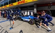 Mechanics make a pit stop with the car of Formula 1 driver Carlos Sainz of the Atlassian W...