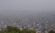 A thick layer of polluted haze covers Kathmandu Valley as seen from a hill station in Kath...