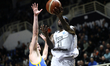 PAOK player Patrick Beverley competes for the ball with Peristeri player Dimitris Kaklaman...