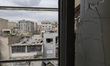 A view of buildings that are damaged during the U.S.-Israeli military campaign that strike...