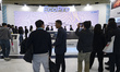 Visitors examine the EcoPro booth during the InterBattery 2026 exhibition at COEX in Seoul...