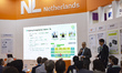 Visitors examine the Netherlands booth during the InterBattery 2026 exhibition at COEX in...