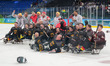 Germany's para ice hockey team celebrates after winning over Slovakia in the Para Ice Hock...