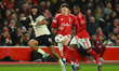 Elliot Anderson of Nottingham Forest puts pressure on Kevin Mbabu of FC Midtjylland during...