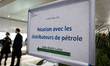 An illustration photo shows a placard that says ''Meeting with the fuel distributors'' dur...