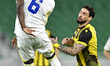 Joao Pedro Dos Santos of Qatar SC and Dami Terawari of Al-Gharafa SC are in action during...