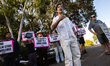 Jason Ignacio White and protesters with One Fair Wage demonstrate in front of the Paramour...