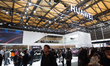 Fairgoers are seen at the Huawei booth at the SNEIC Expo Center in Shanghai, China, on Mar...