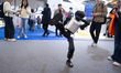 A robot performs kicking at SNEIC Expo Center in Shanghai, China, on March 12, 2026. 
