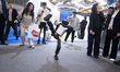 A robot performs kicking at SNEIC Expo Center in Shanghai, China, on March 12, 2026. 