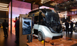 A robot bus is on display at the Navee booth at the SNEIC expo center in Shanghai, China,...
