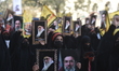 People take part in a rally to mark Youm-e-Quds (Jerusalem Day) in Lahore, Pakistan, on Ma...