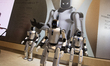 Three dancing robots are on display during the second day of the Awe 2026 trade fair at SN...
