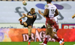 Luke Hooley puts up a high kick during the BetFred Super League match between Wigan Warrio...