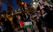 Pro-Palestinian activists gather outside the Palau Blaugrana in Barcelona, Catalonia, Spai...