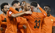 Cristo Perez of Umm Salal SC celebrates with teammates after scoring during the Qatar Star...